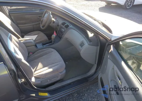 2004 Toyota Avalon Xl z USA, uszkodzony, nr VIN 4T1BF28B34U359457